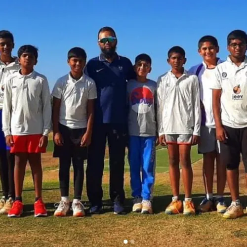 Players and coaches during a bowling clinic session